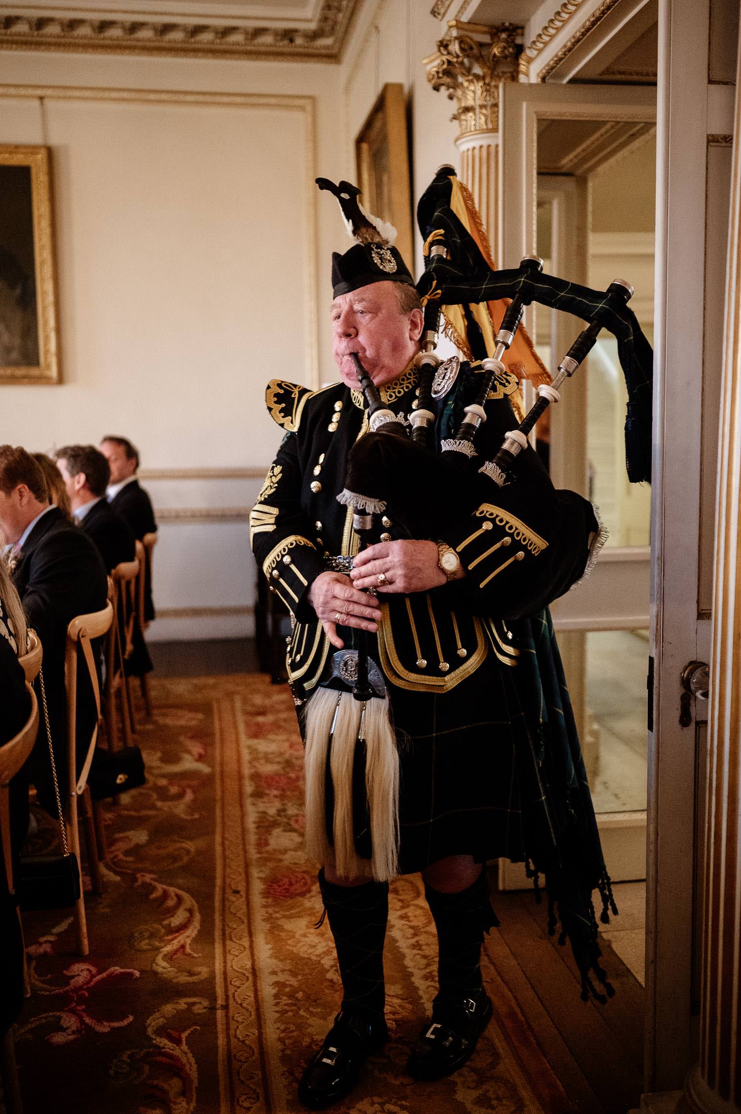 Gordon Highland Piper at a wedding at Came House, Dorset.