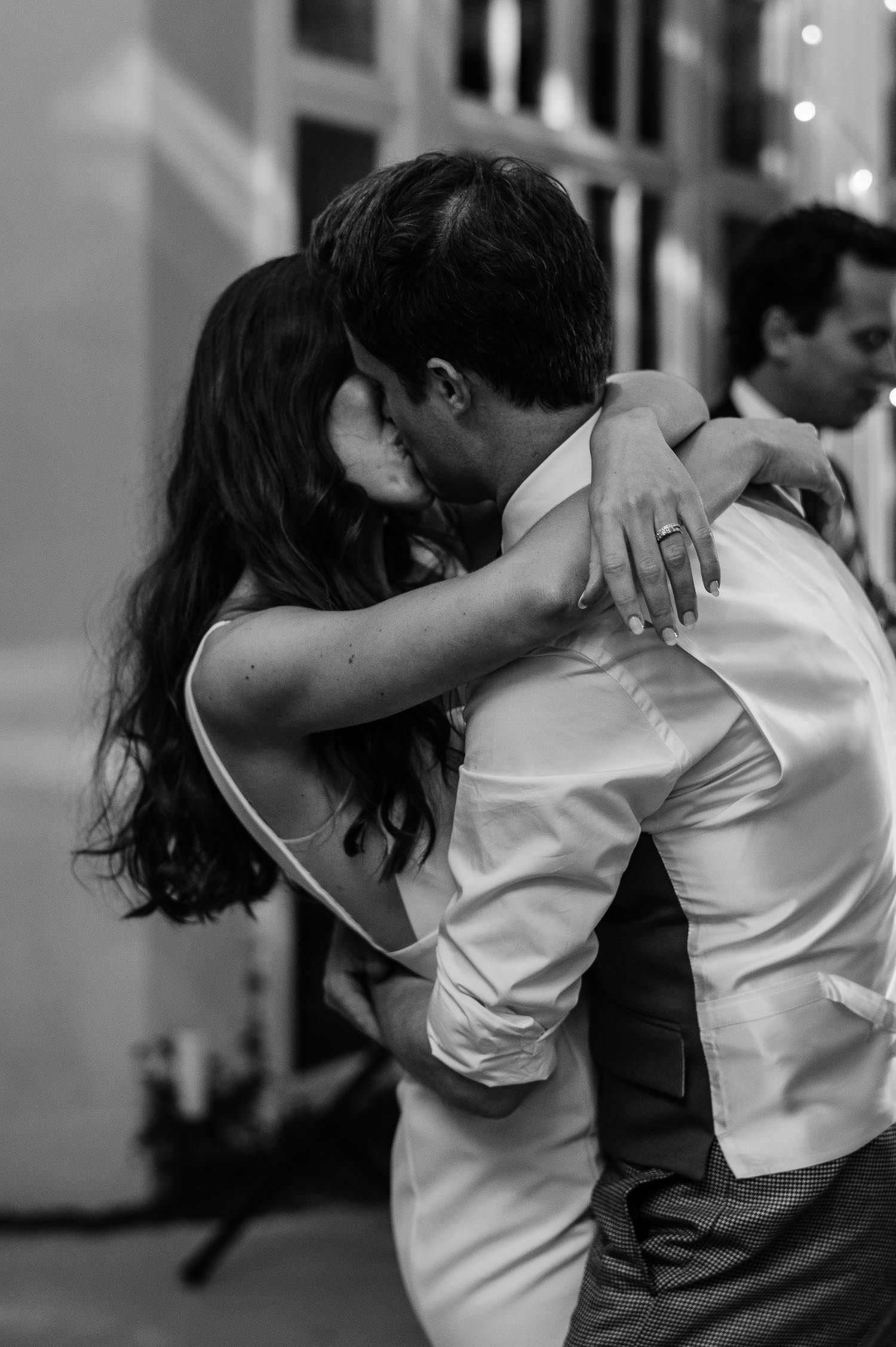 Kiss during first dance by Sophia Veres Photography