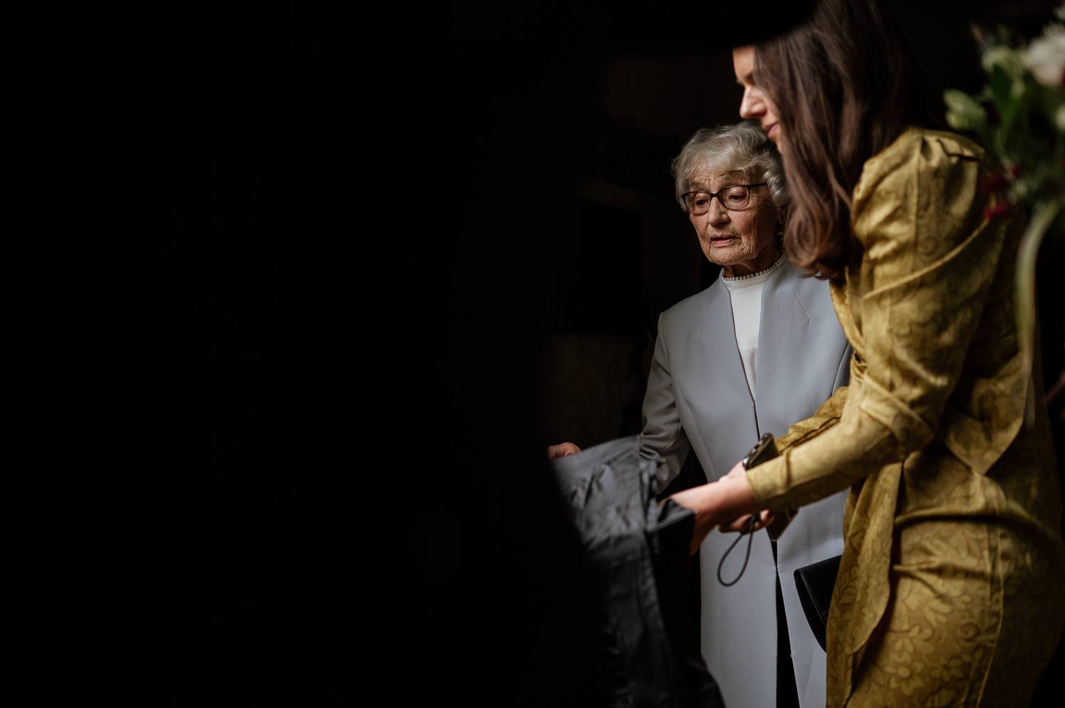 The grandmother of the bride leaving the wedding ceremony at Came House.